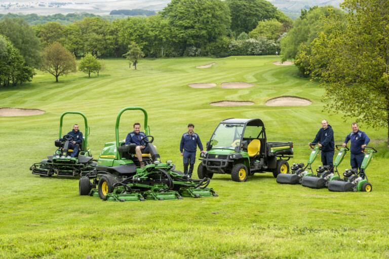 Members of the greenkeeping team at Chorley display the new John Deere machinery they are now using - Copyright John Deere