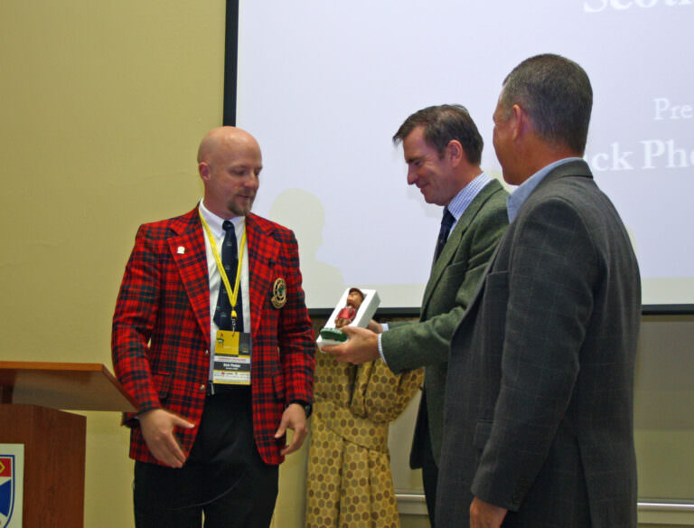 Rick Phelps, left, with David Krause, centre, and Graham Papworth, right