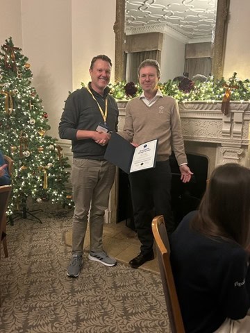 David Bily presented with Sustainable Design Leader certificate by Gary Johnston, November 2025